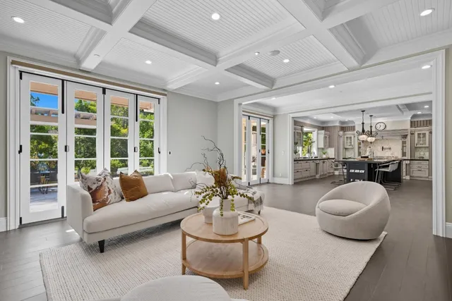 a view of a livingroom with furniture and window