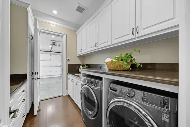 a living room with furniture window and wooden floor