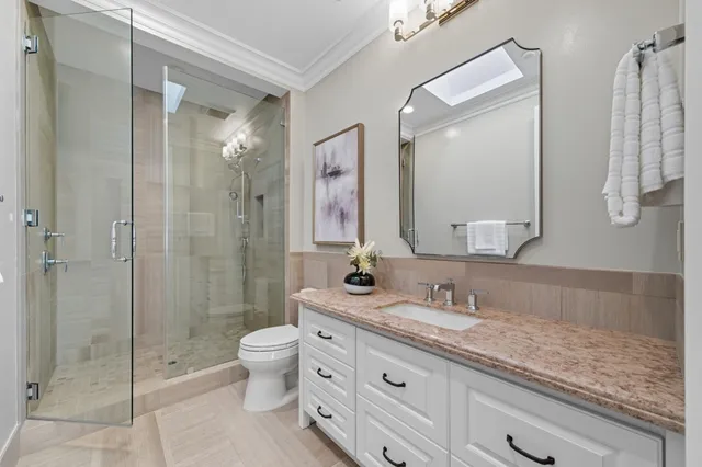a view of a patio with a dining table and chairs
