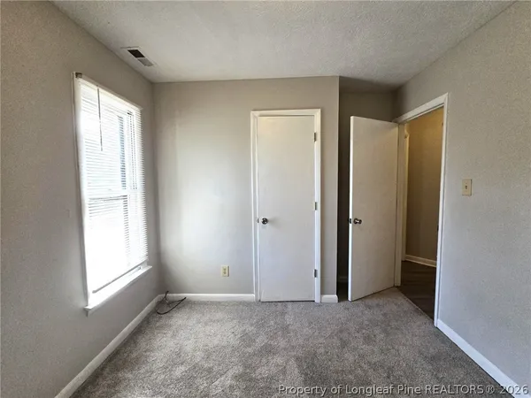 a view of an empty room with window