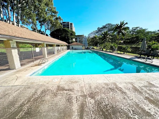 a view of an outdoor space with a swimming pool