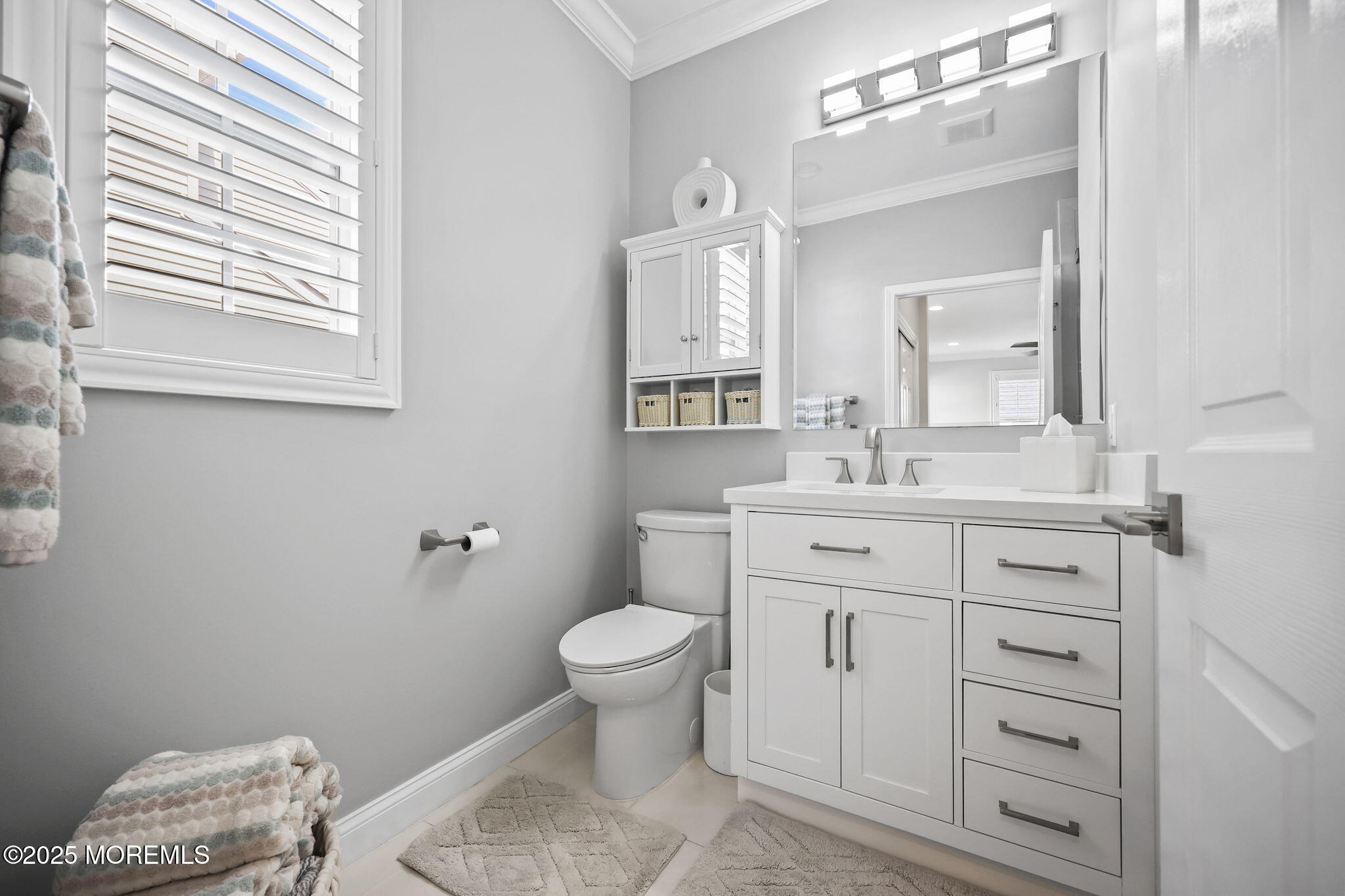 21 Silver Maple Lane Howell, NJ 07731 - Photo 15 of 22 a bathroom with a toilet sink and mirror