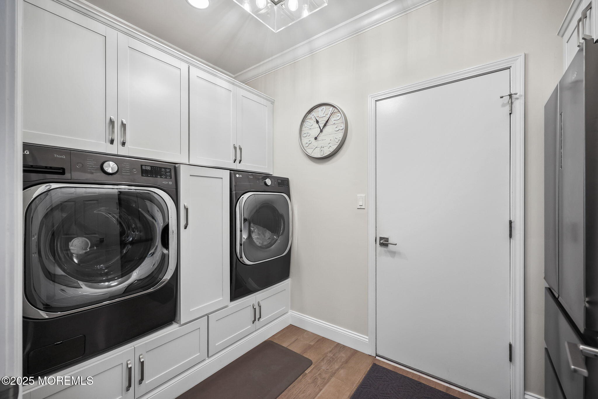 21 Silver Maple Lane Howell, NJ 07731 - Photo 20 of 22 a view of storage and utility room with washer and dryer