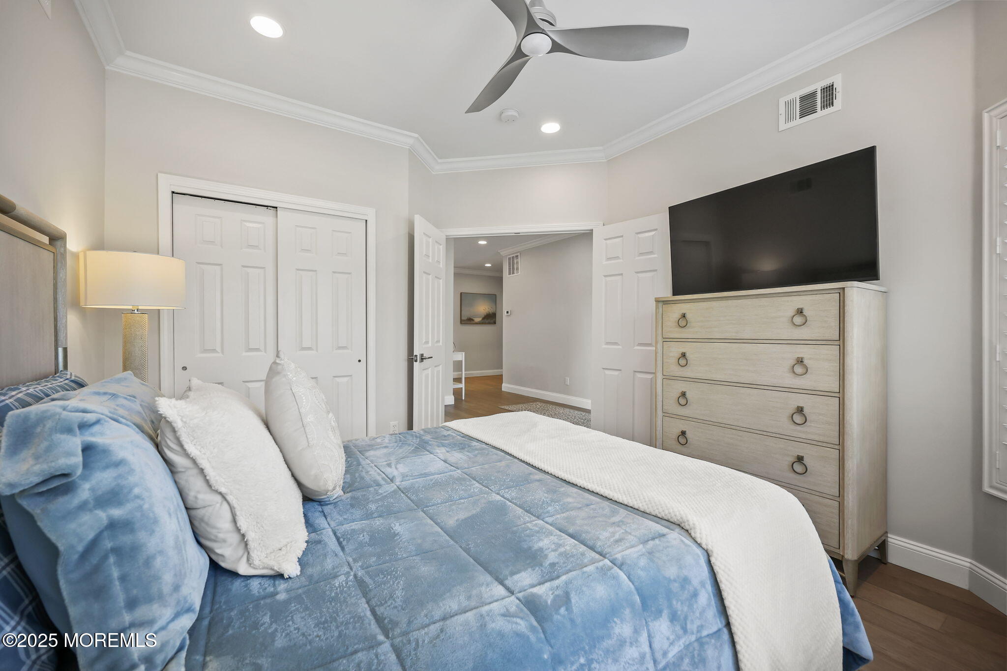 21 Silver Maple Lane Howell, NJ 07731 - Photo 5 of 22 a bedroom with a bed a television and a dresser