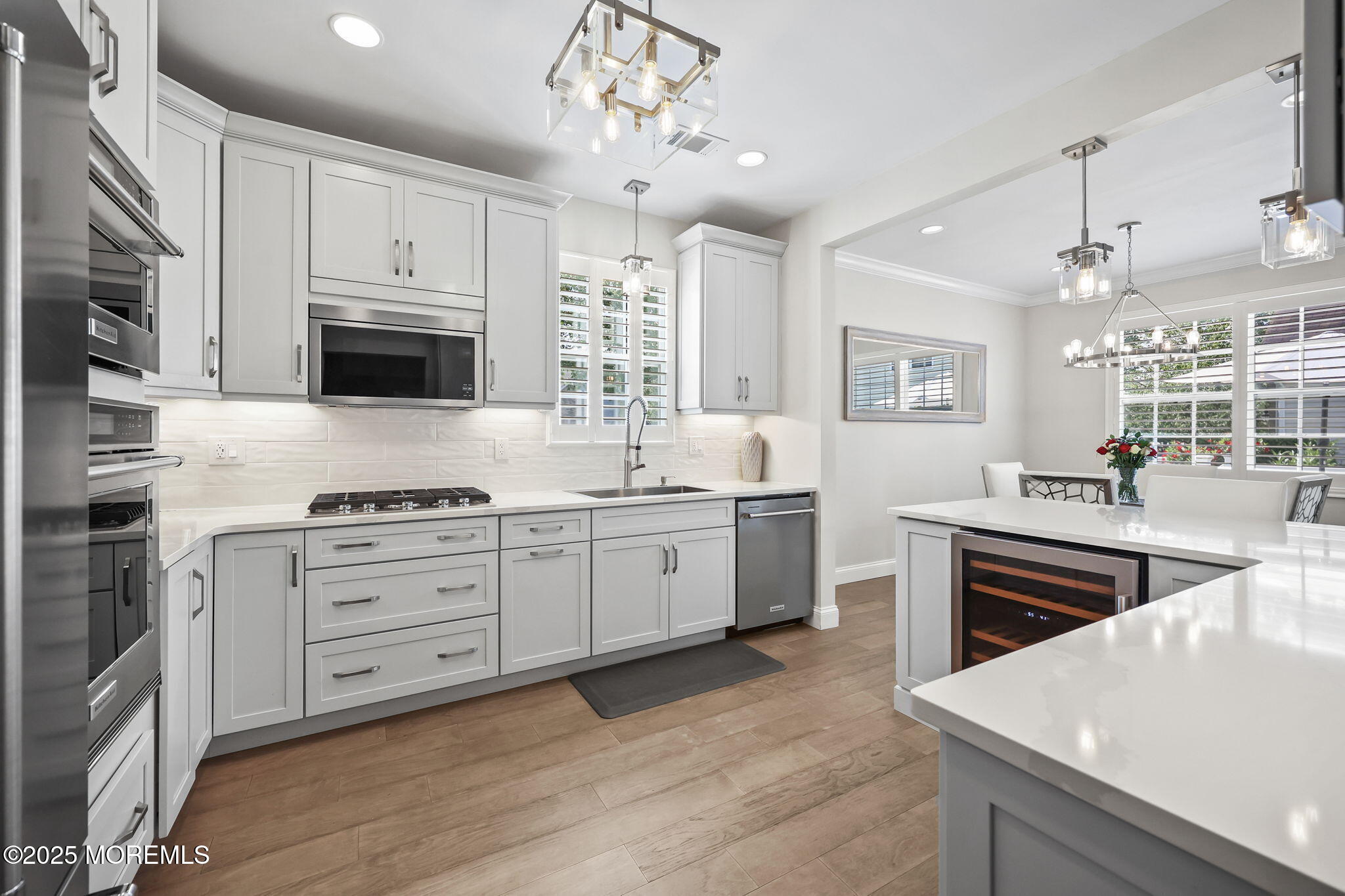 21 Silver Maple Lane Howell, NJ 07731 - Photo 7 of 22 a kitchen with granite countertop a sink stainless steel appliances and cabinets