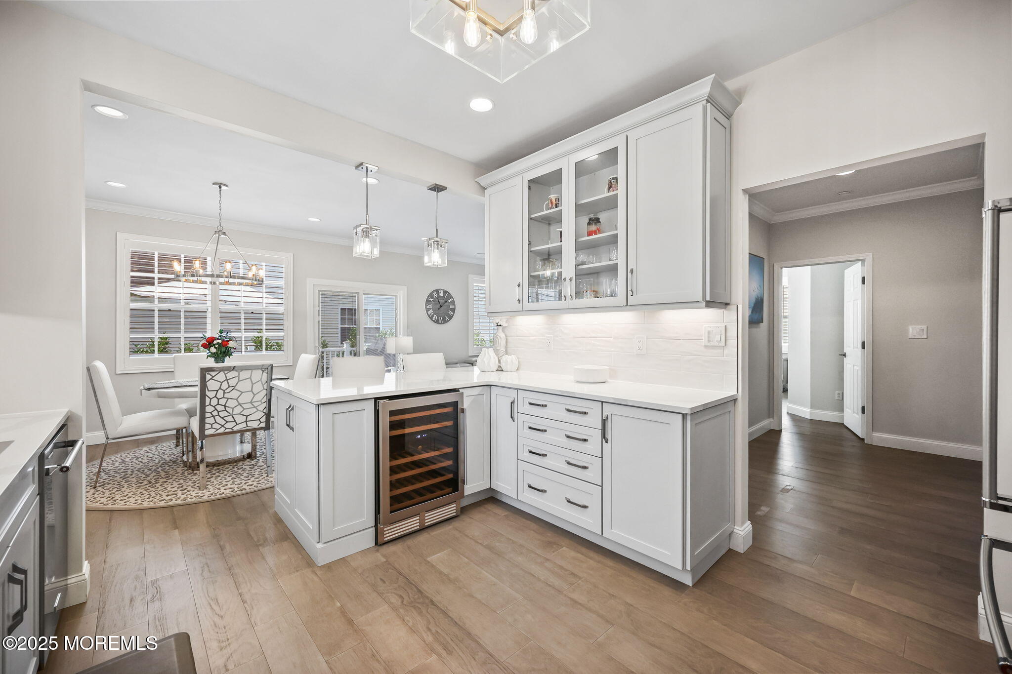 21 Silver Maple Lane Howell, NJ 07731 - Photo 9 of 22 a kitchen with stainless steel appliances sink cabinets and wooden floor