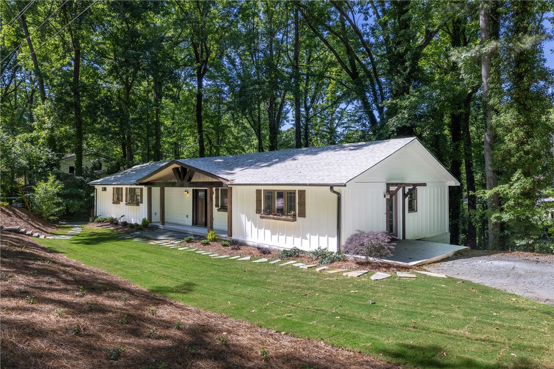 309 Woodland Way Clemson, SC 29631 - Photo 1 of 43 This charming home features a lovely front porch and a well-maintained lawn.