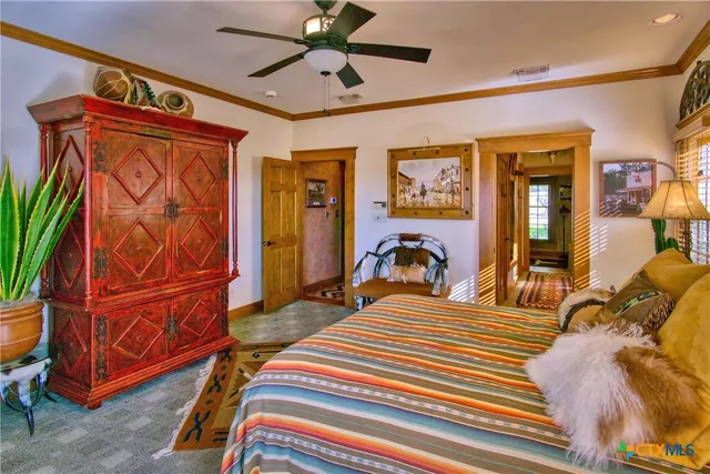 a balcony with a glass door