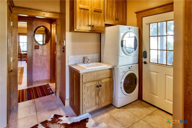 a living room with furniture fireplace and flat screen tv