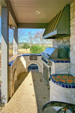 a backyard of a house with seating space