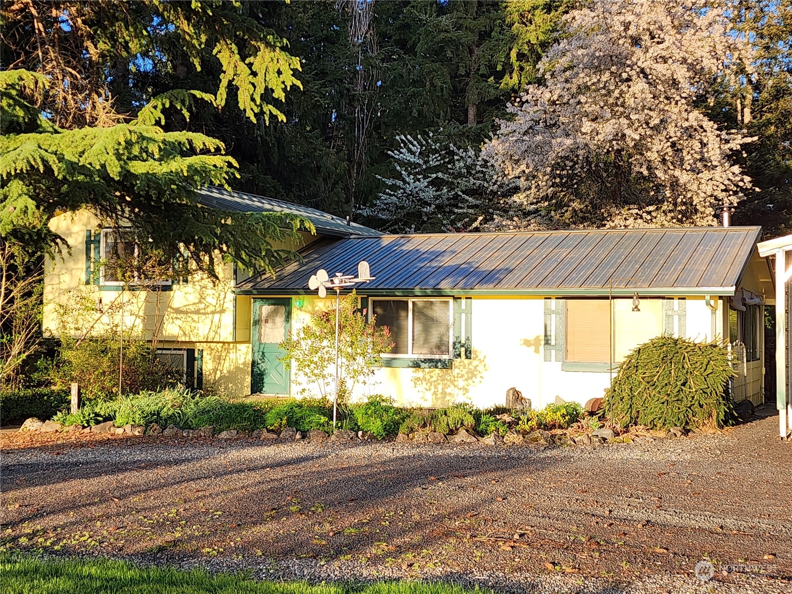 107 Peterson Road Chehalis, WA 98532 - Photo 1 of 35 a front view of a house with a yard and garage
