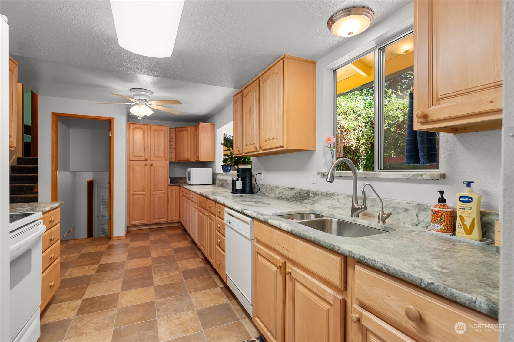 107 Peterson Road Chehalis, WA 98532 - Photo 21 of 35 a view of a kitchen with a sink and a window