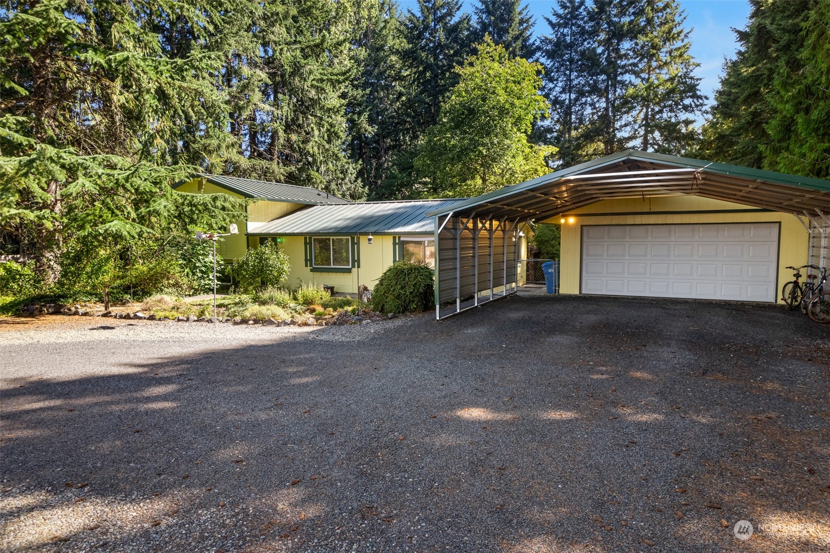 107 Peterson Road Chehalis, WA 98532 - Photo 3 of 35 a front view of a house with a yard and garage
