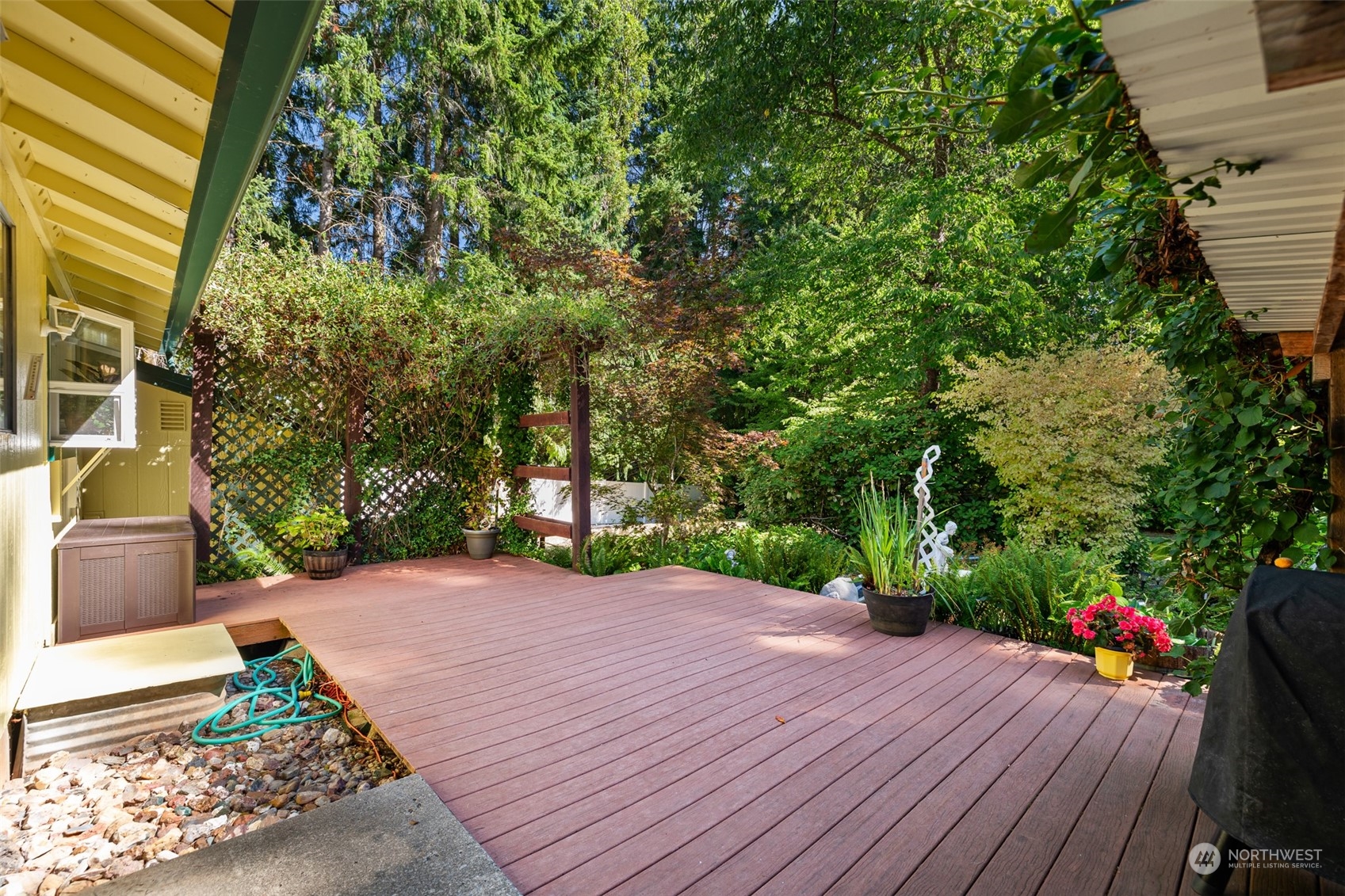 107 Peterson Road Chehalis, WA 98532 - Photo 7 of 35 a view of a backyard with potted plants