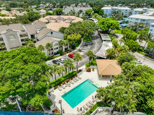 an aerial view of a house with a garden