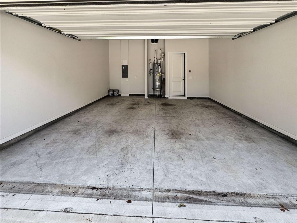 677 Stickley Oak Way Woodstock, GA 30189 - Photo 29 of 30 a view of a garage