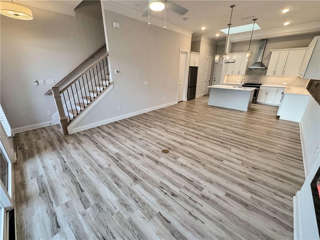 677 Stickley Oak Way Woodstock, GA 30189 - Photo 6 of 30 a view of a living room and wooden floor