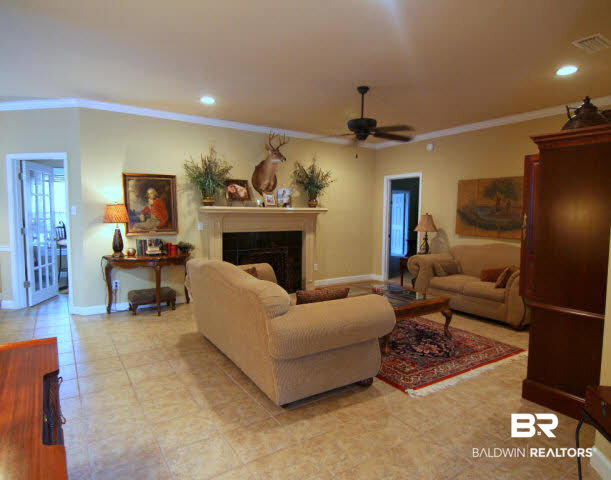7263 Highpointe Place East Daphne, AL 36527 - Photo 3 of 22 Molding throughout, tile floors in living areas and a beautiful gas fireplace to enjoy on cold winter nights!