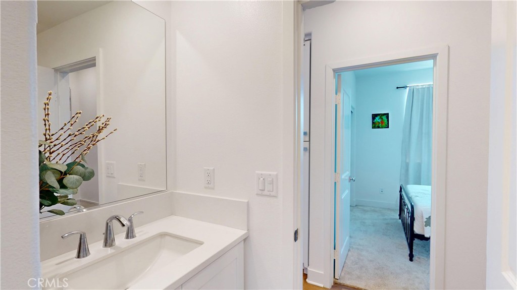 2221 Bluegrass Way Rancho Mission Viejo, CA 92694 - Photo 19 of 35 a bathroom with a sink and a mirror