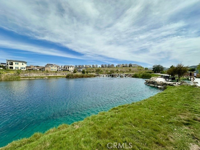 2221 Bluegrass Way Rancho Mission Viejo, CA 92694 - Photo 22 of 35 a view of a lake with houses in the back