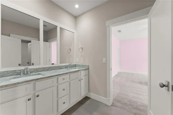 a living room with furniture wooden floor and a view