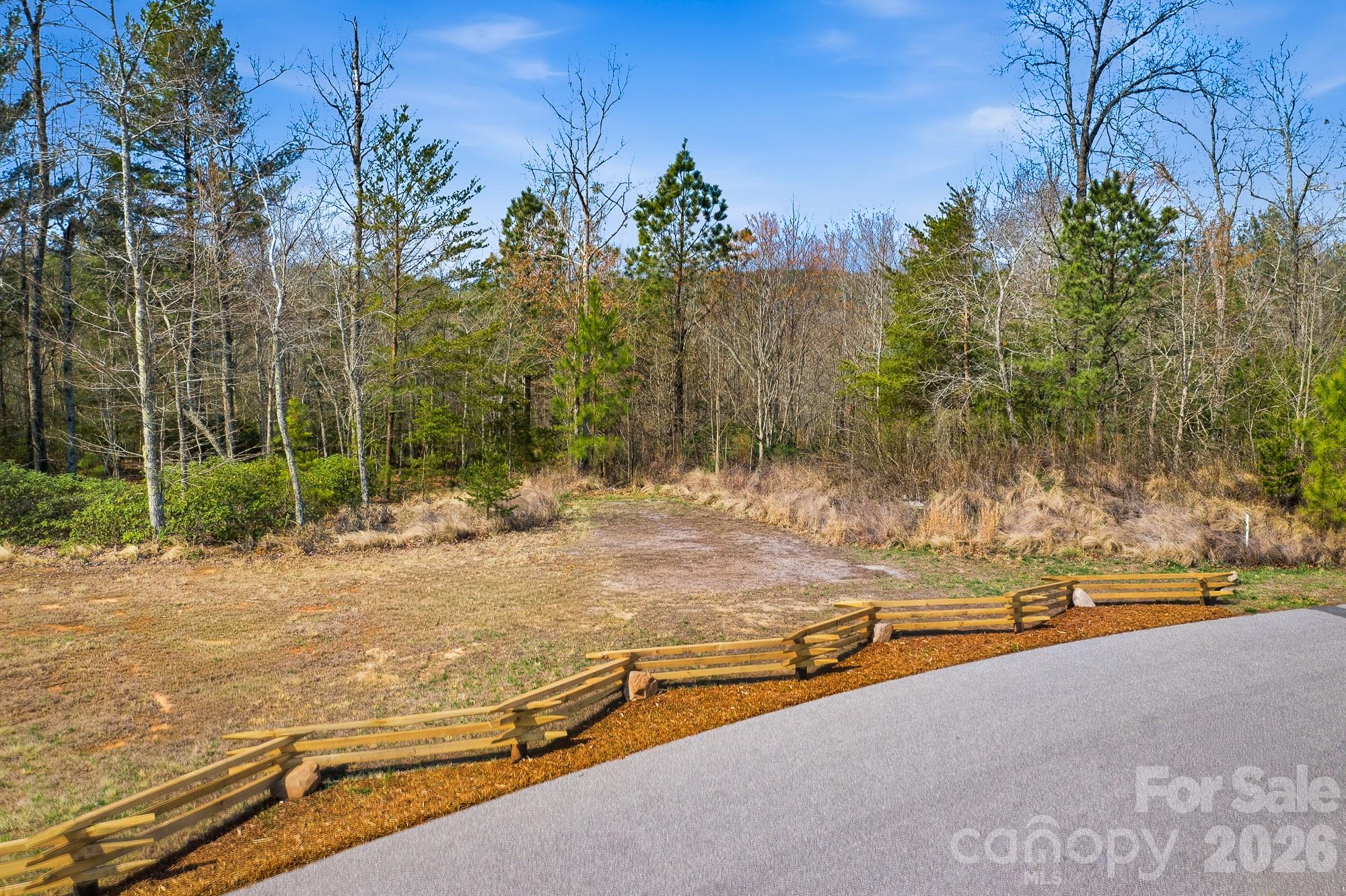 184 Ridge Point Road Nebo, NC 28761 - Photo 2 of 6 a view of a swimming pool with a patio