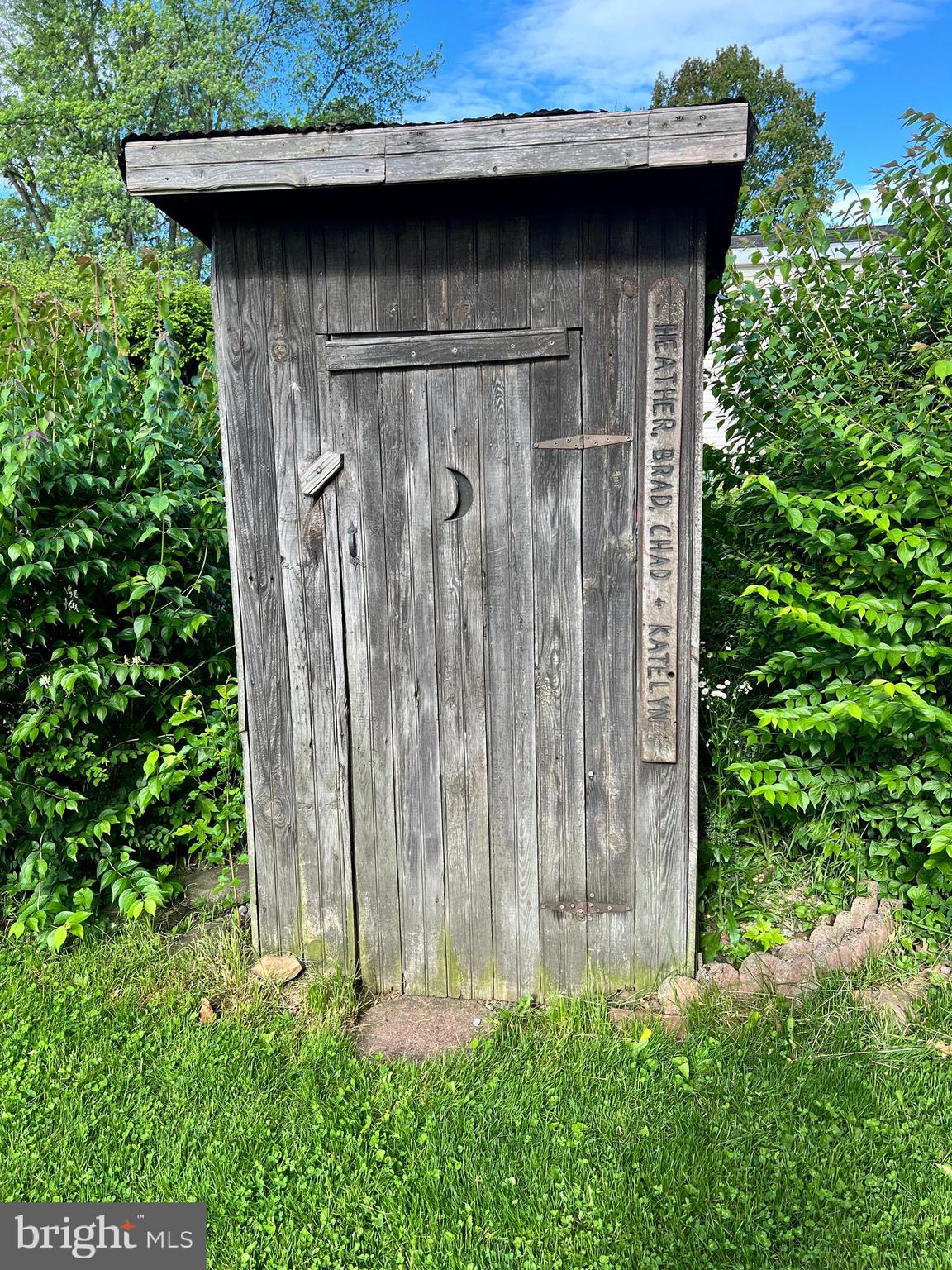 252 Doe Run Road Manheim, PA 17545 - Photo 19 of 32 a wooden door with trees in the background