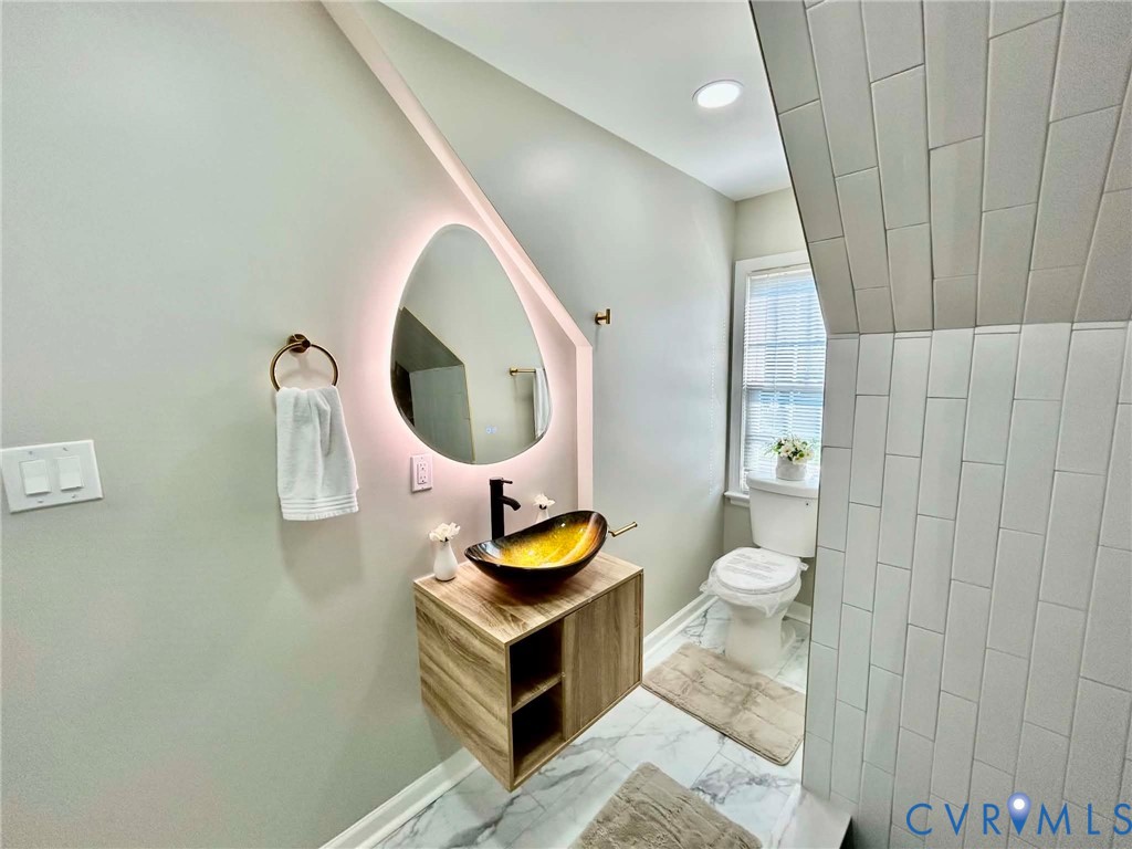 7110 Manning Road Chesterfield, VA 23832 - Photo 39 of 50 Modern bathroom featuring a teardrop-shaped illumi