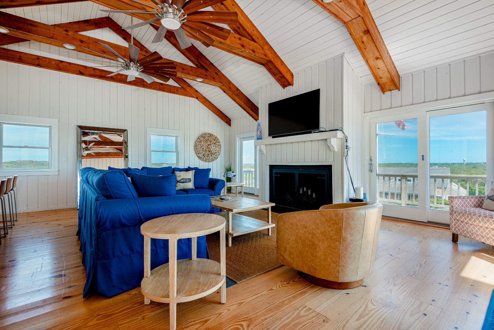 1 Reeds Way Nantucket, MA 02554 - Photo 36 of 51 a living room with furniture a flat screen tv and a fireplace