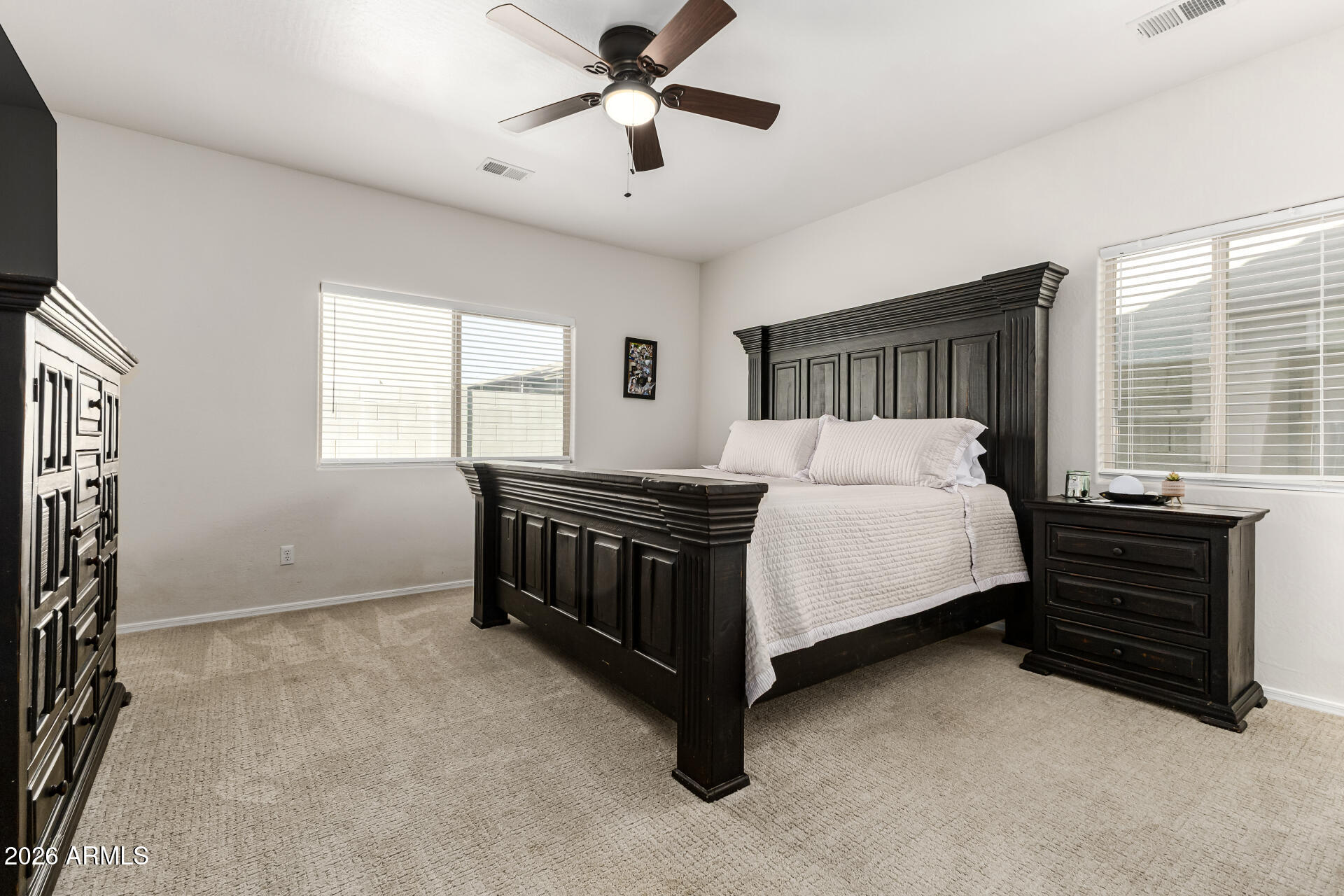 1896 West Rd Agent Street Apache Junction, AZ 85120 - Photo 12 of 21 a bedroom with a bed and windows