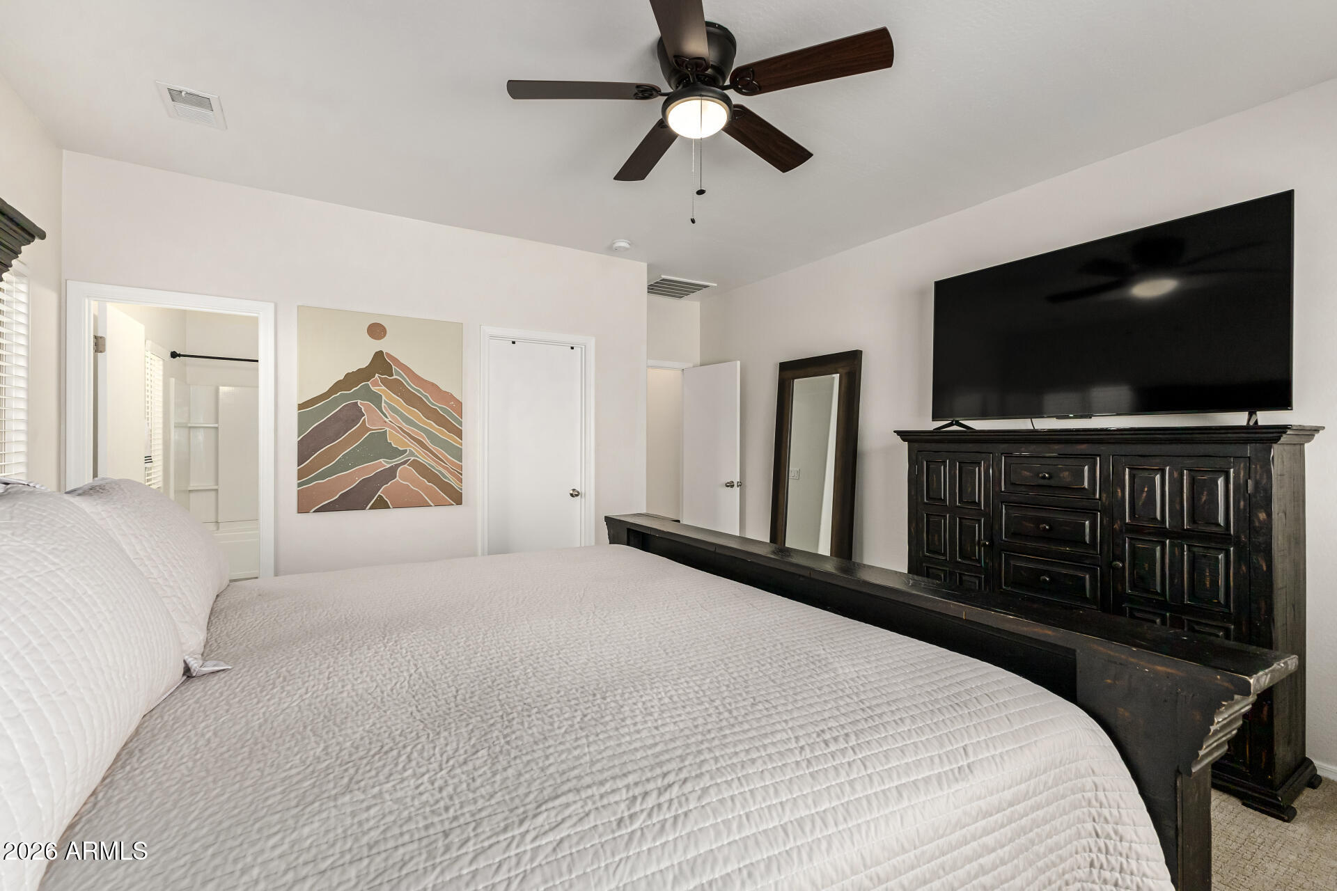 1896 West Rd Agent Street Apache Junction, AZ 85120 - Photo 13 of 21 a bedroom with a bed and a flat screen tv