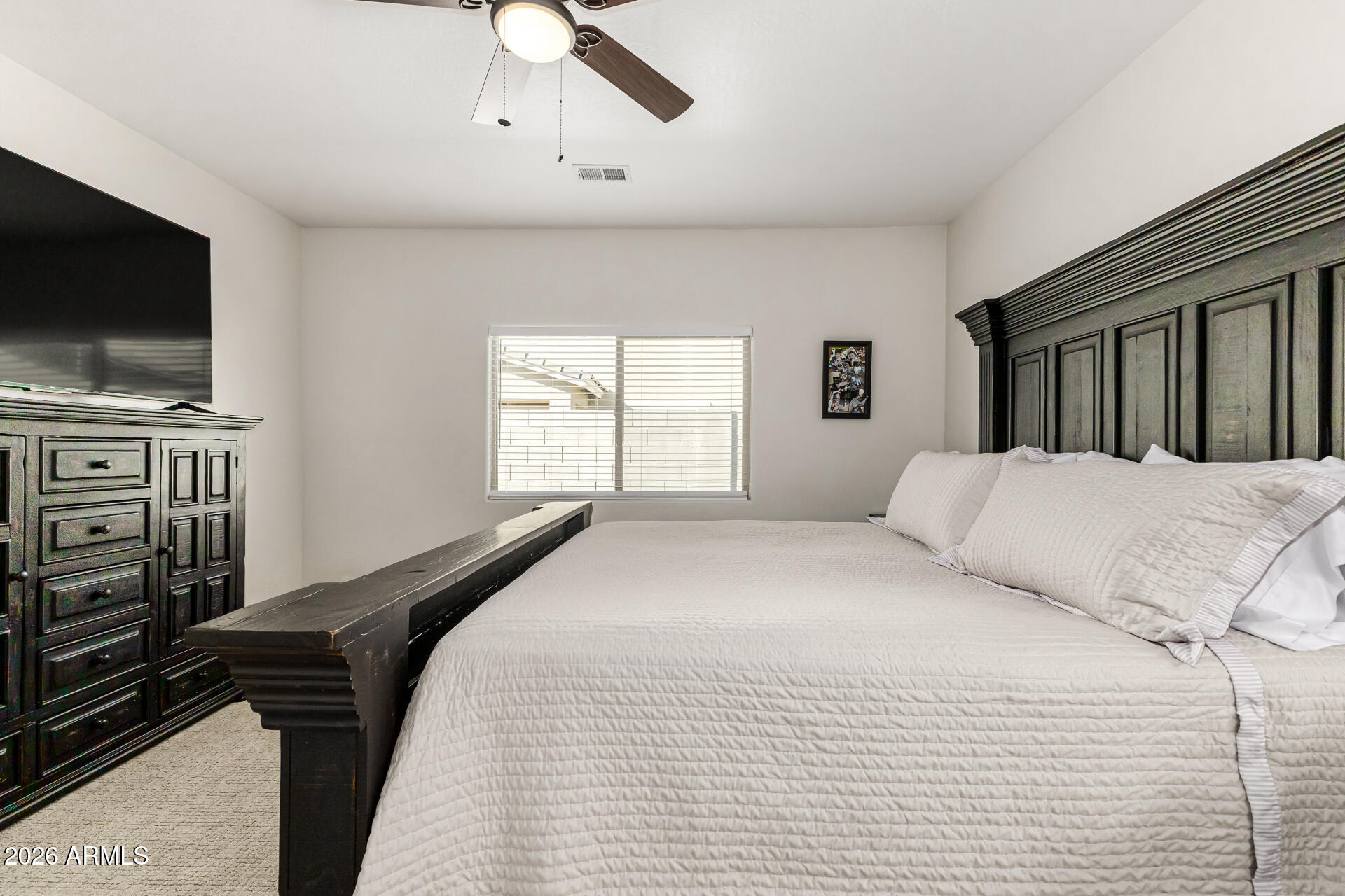 1896 West Rd Agent Street Apache Junction, AZ 85120 - Photo 14 of 21 a bedroom with a bed and a flat screen tv