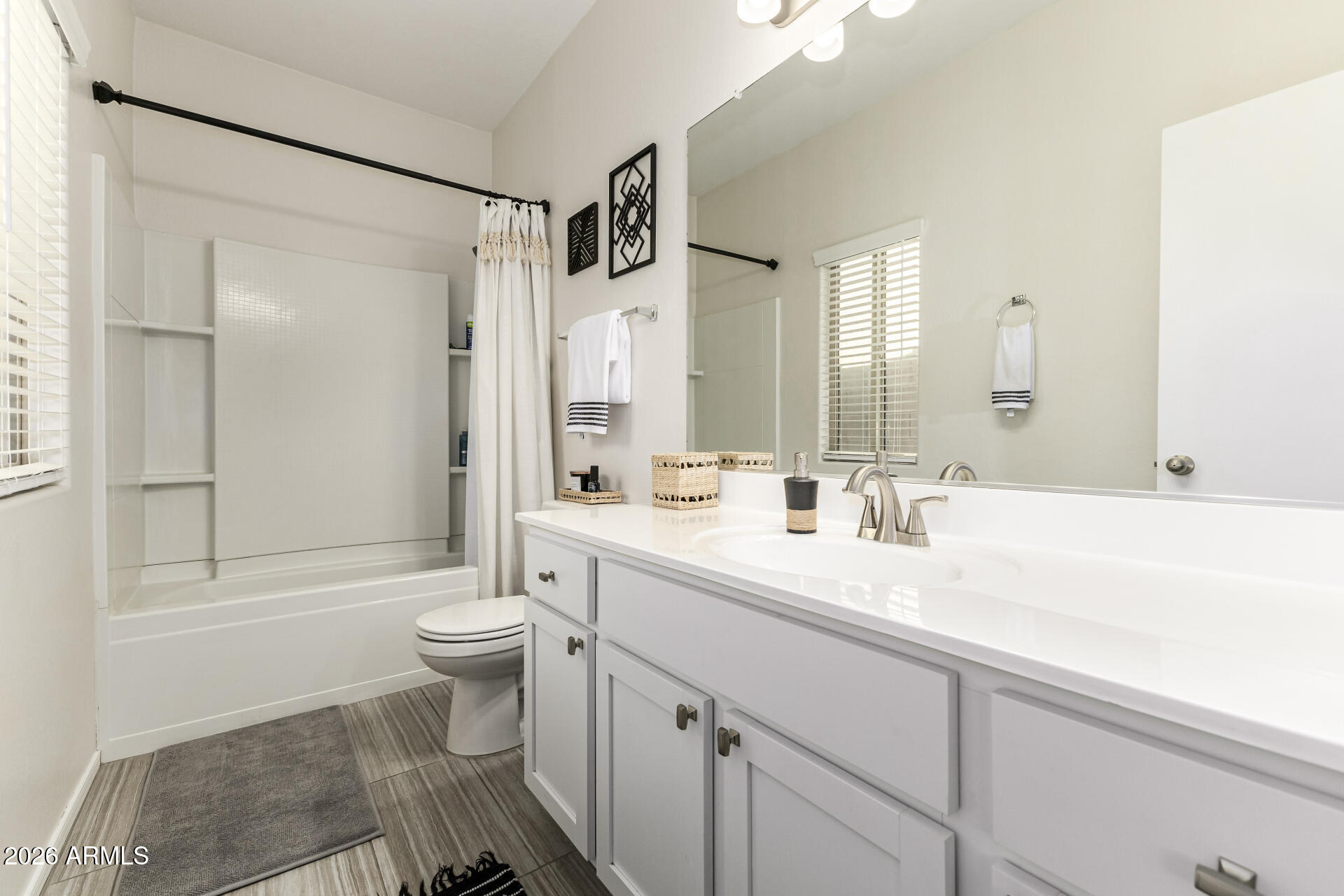 1896 West Rd Agent Street Apache Junction, AZ 85120 - Photo 16 of 21 a bathroom with a double vanity sink toilet mirror and shower