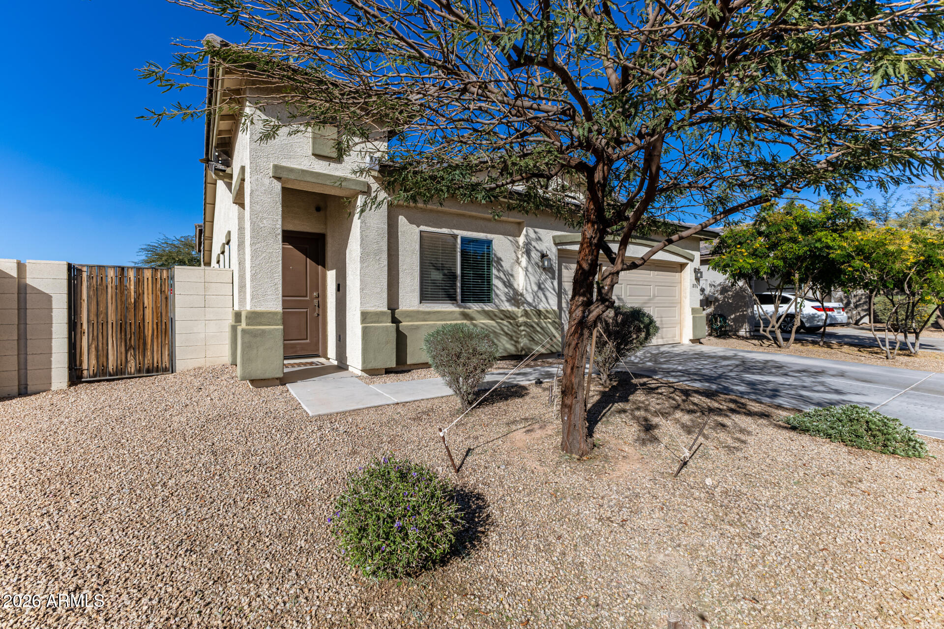 1896 West Rd Agent Street Apache Junction, AZ 85120 - Photo 2 of 21 a view of house with outdoor seating area