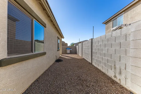 a view of a house with a street
