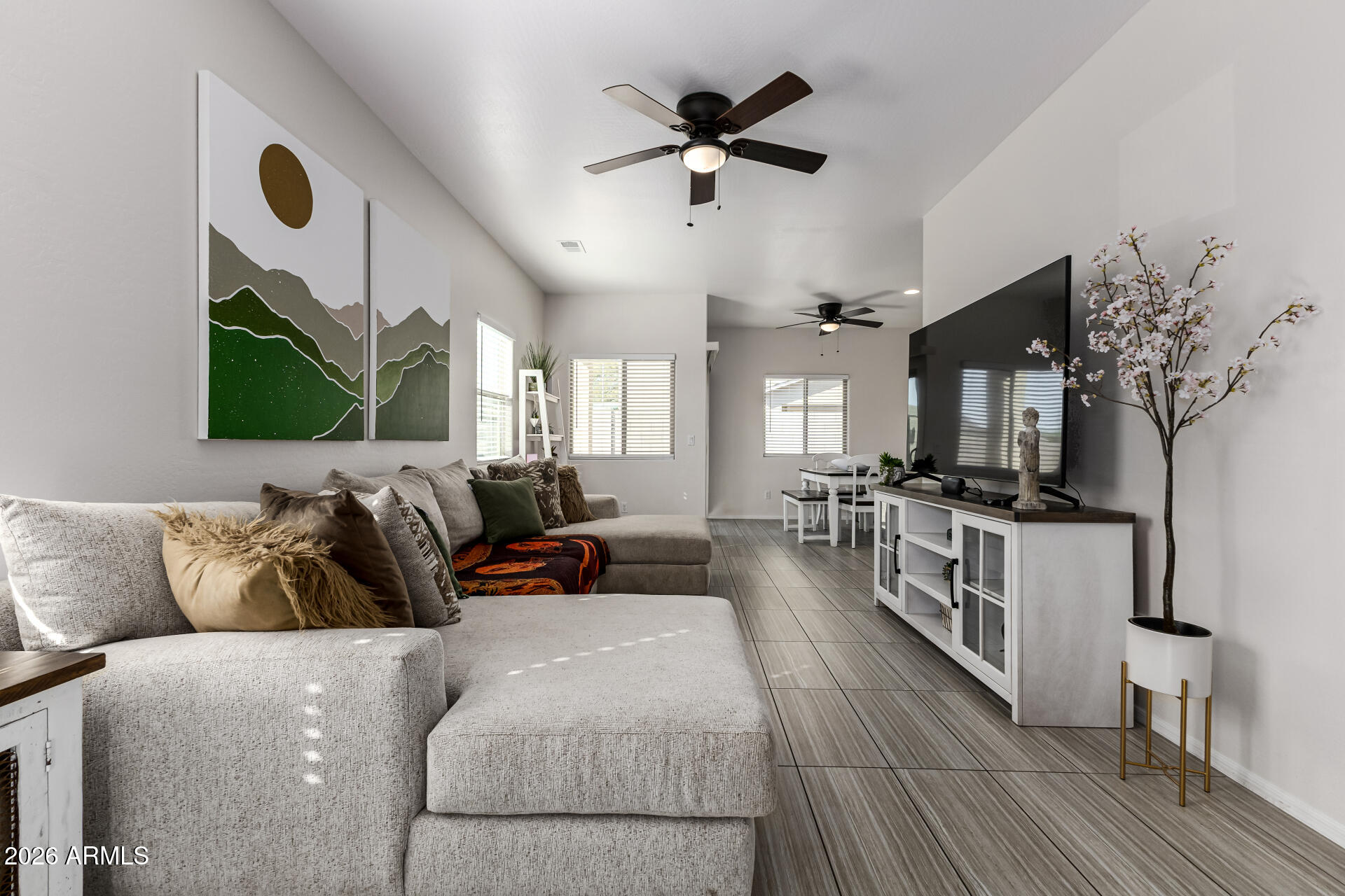 1896 West Rd Agent Street Apache Junction, AZ 85120 - Photo 3 of 21 a living room with furniture fireplace and flat screen tv