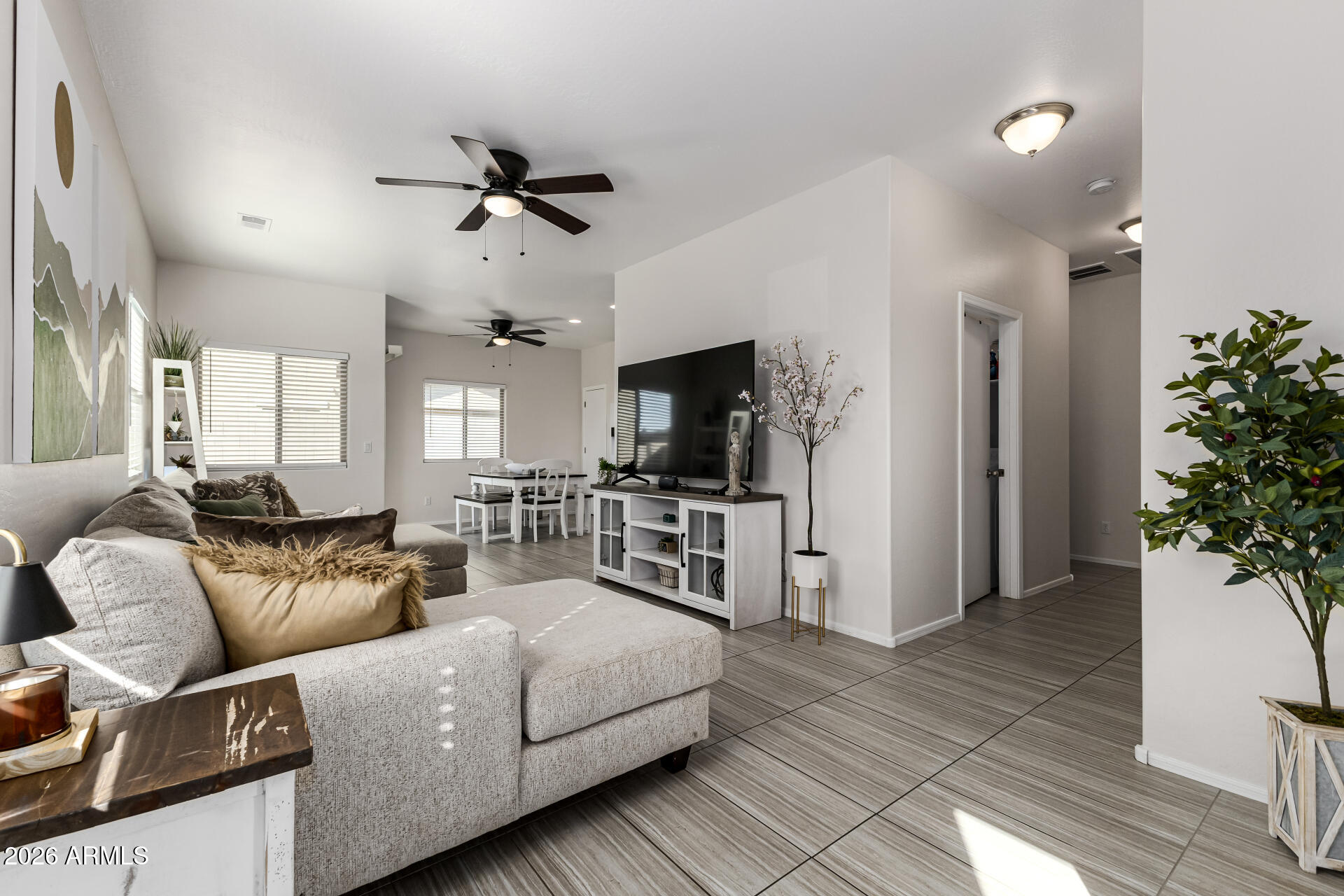 1896 West Rd Agent Street Apache Junction, AZ 85120 - Photo 4 of 21 a living room with furniture and a flat screen tv