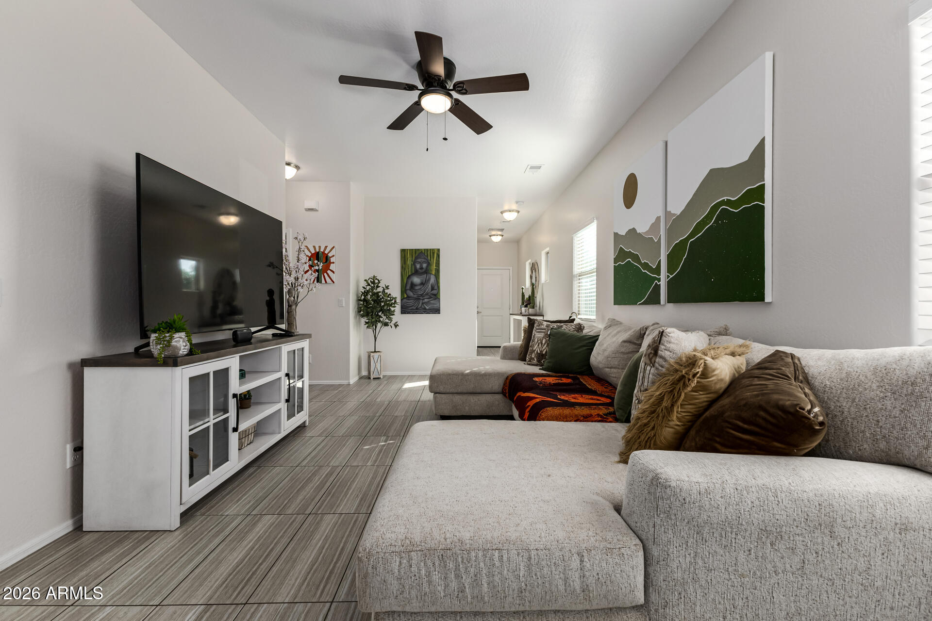 1896 West Rd Agent Street Apache Junction, AZ 85120 - Photo 6 of 21 a living room with furniture and a flat screen tv