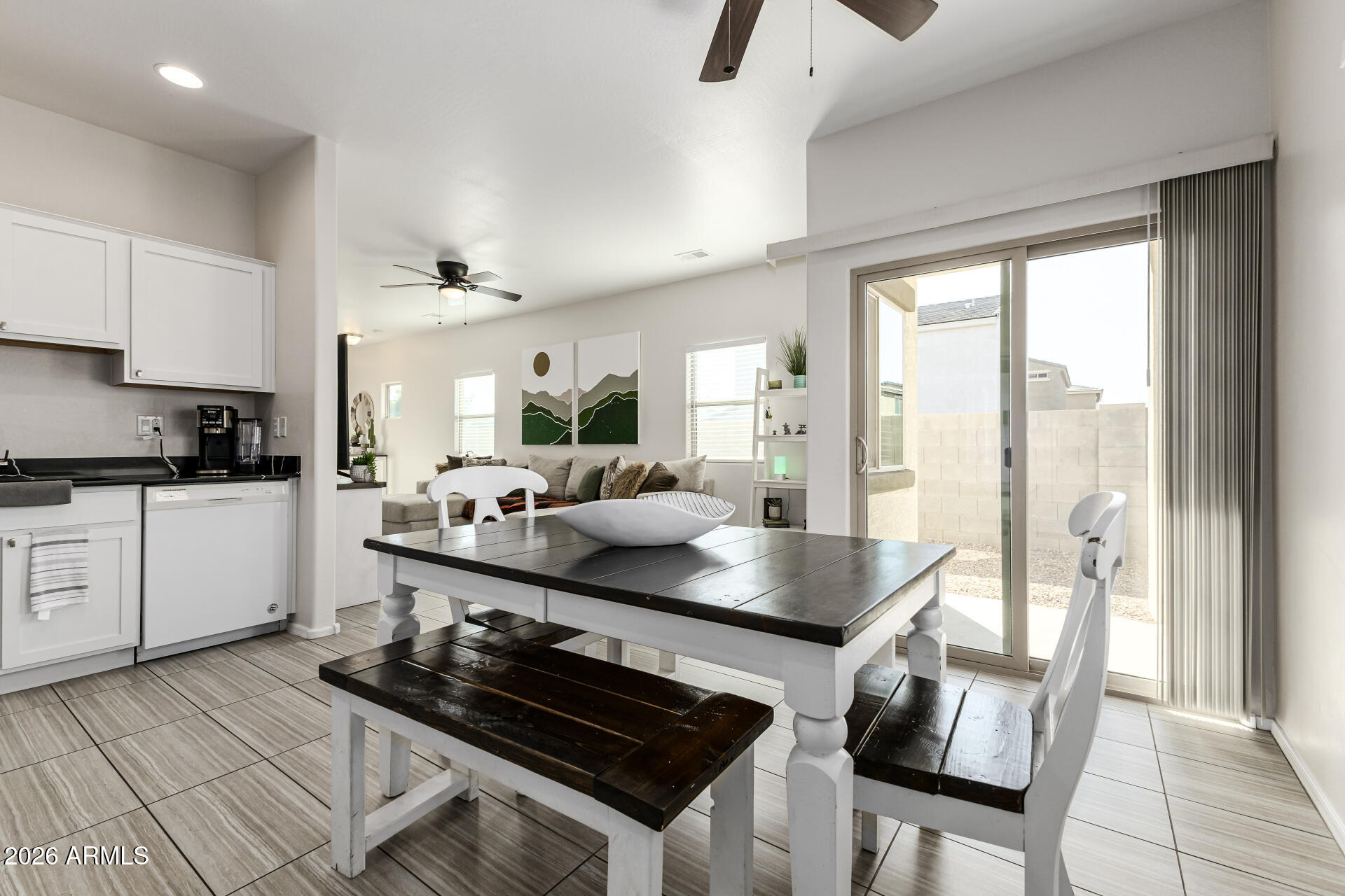 1896 West Rd Agent Street Apache Junction, AZ 85120 - Photo 8 of 21 a kitchen with stainless steel appliances granite countertop a stove a sink and a refrigerator