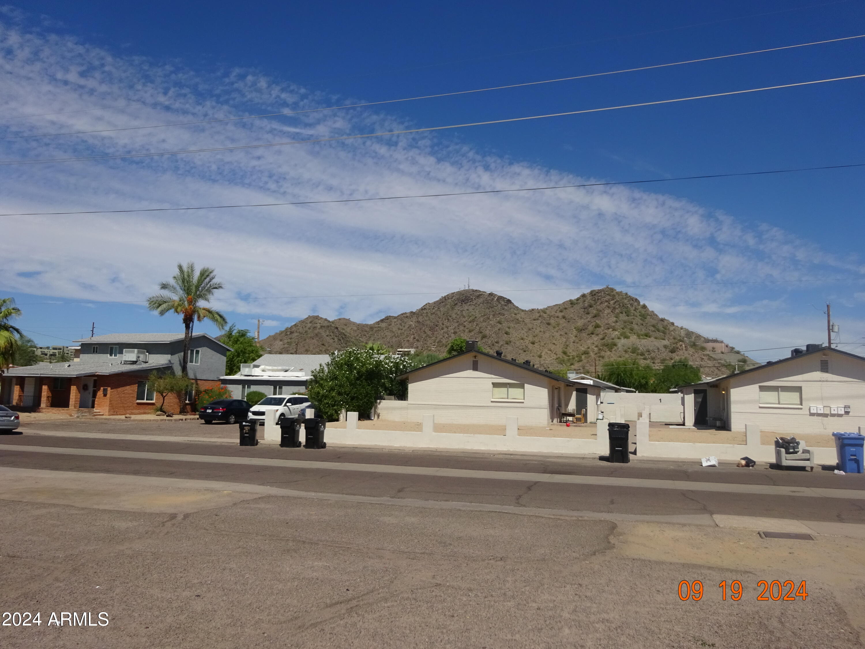 341 East Vogel Avenue, Unit 2 Phoenix, AZ 85020 - Photo 12 of 12 front view of a house with a street