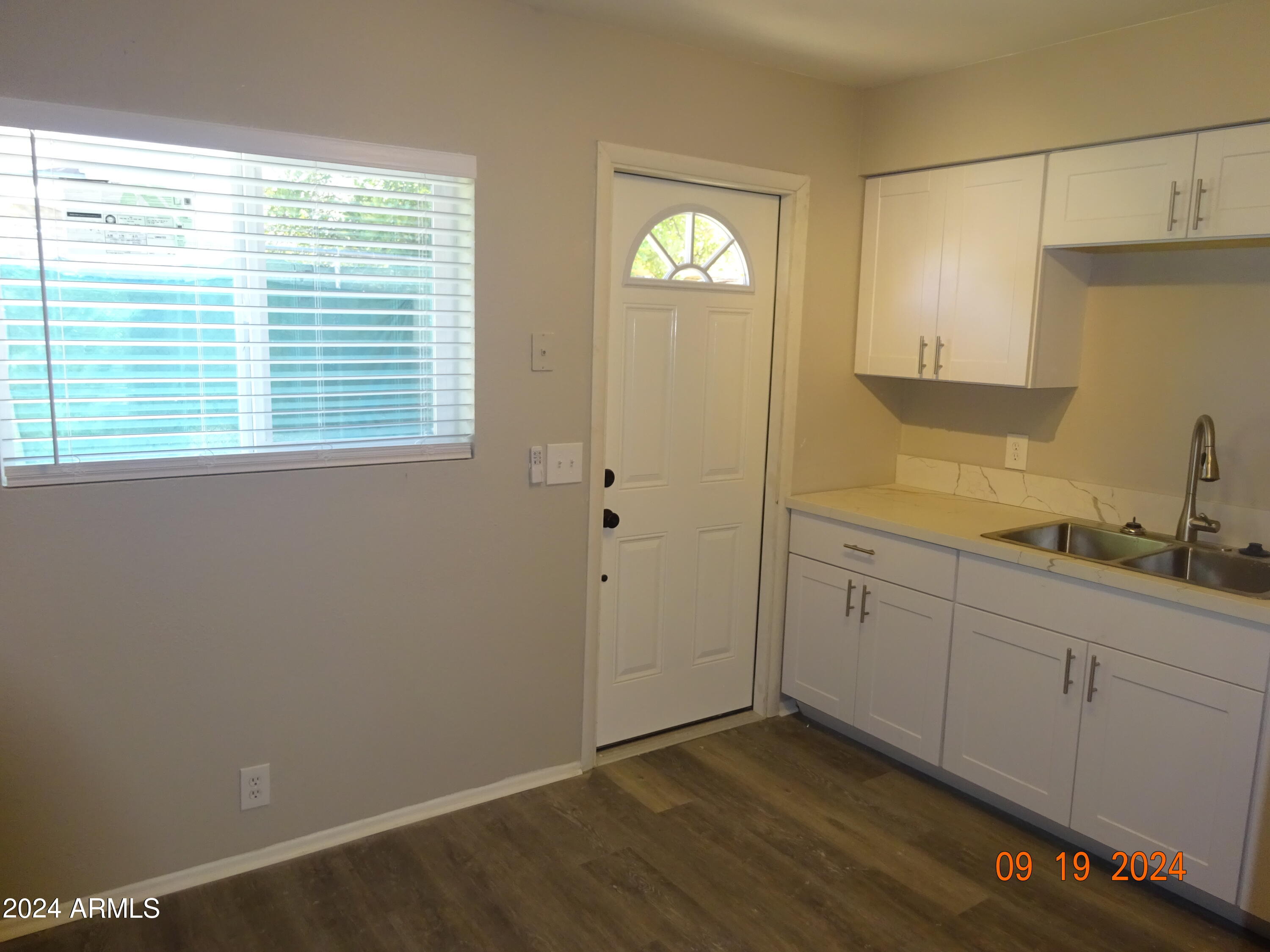 341 East Vogel Avenue, Unit 2 Phoenix, AZ 85020 - Photo 2 of 12 a view of a kitchen with a sink