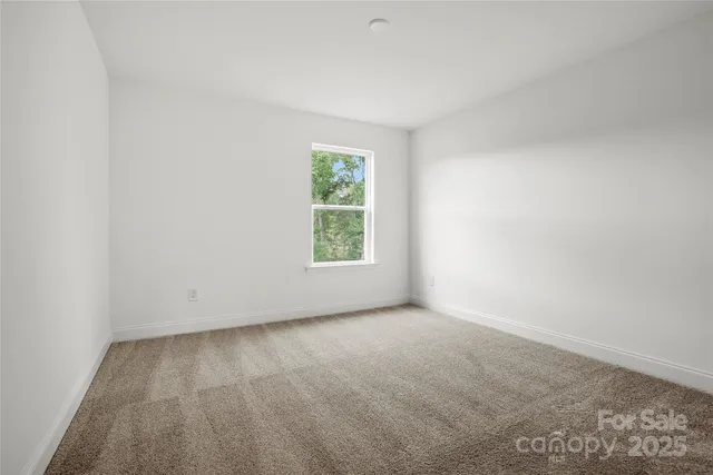 a view of an empty room with window