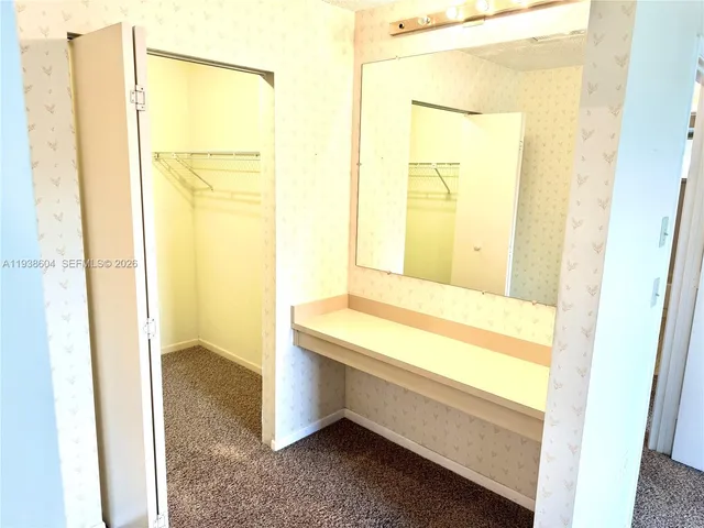 a bathroom with a tub and shower