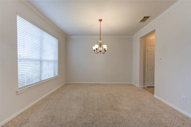 an empty room that has a window