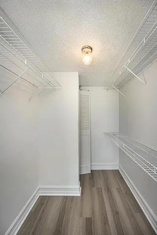 a view of room with walk in closet