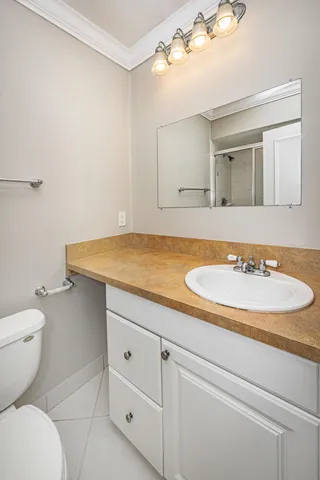 a bathroom with a sink and a toilet