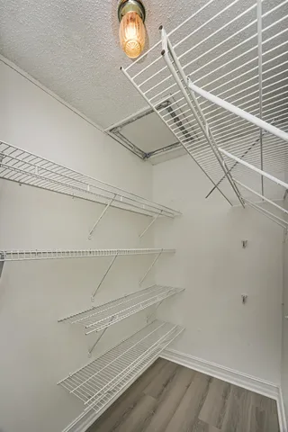 a view of small space with racks on the wall
