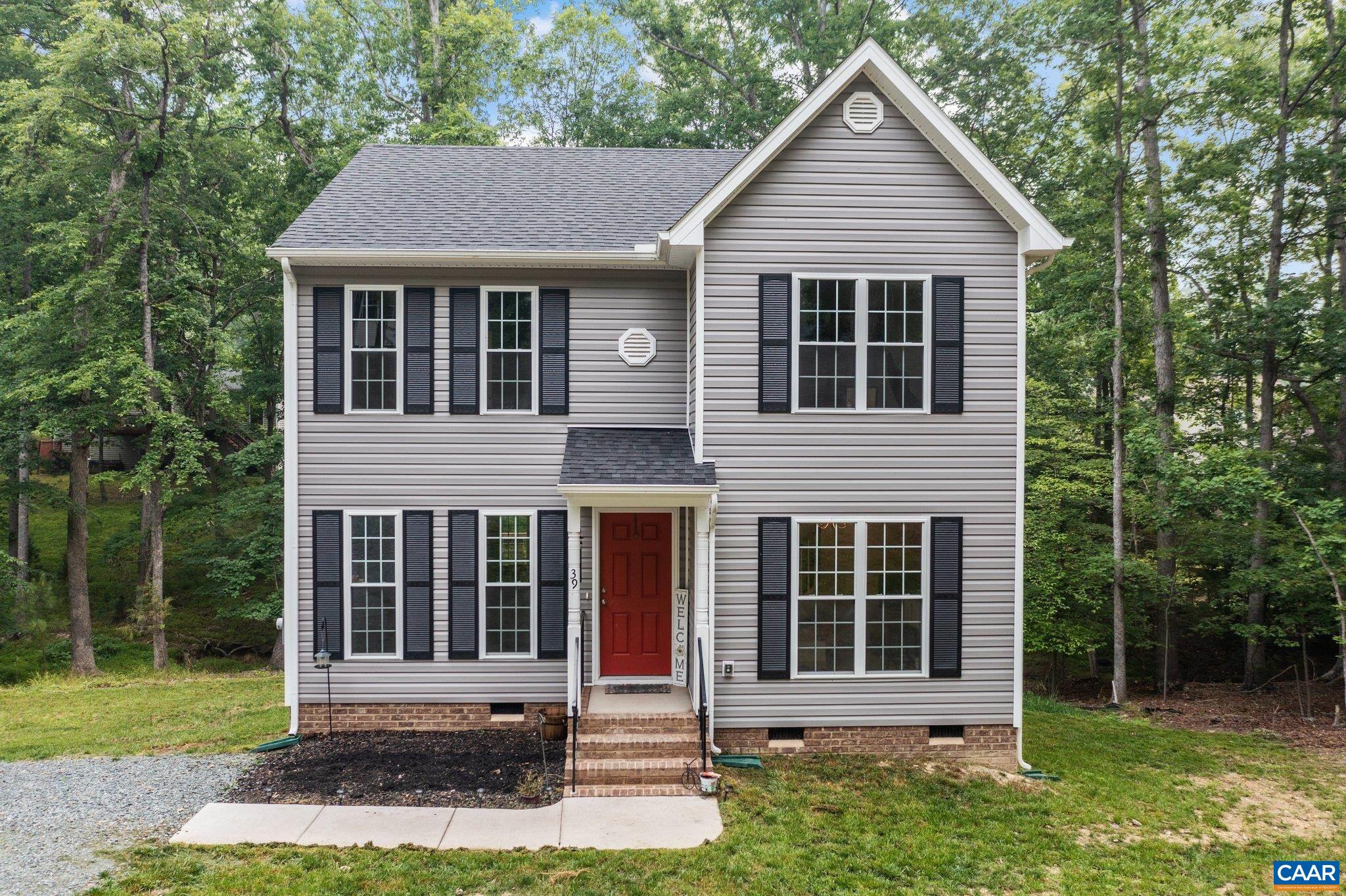 39 Amethyst Road Palmyra, VA 22963 - Photo 1 of 42 front view of a house with a yard