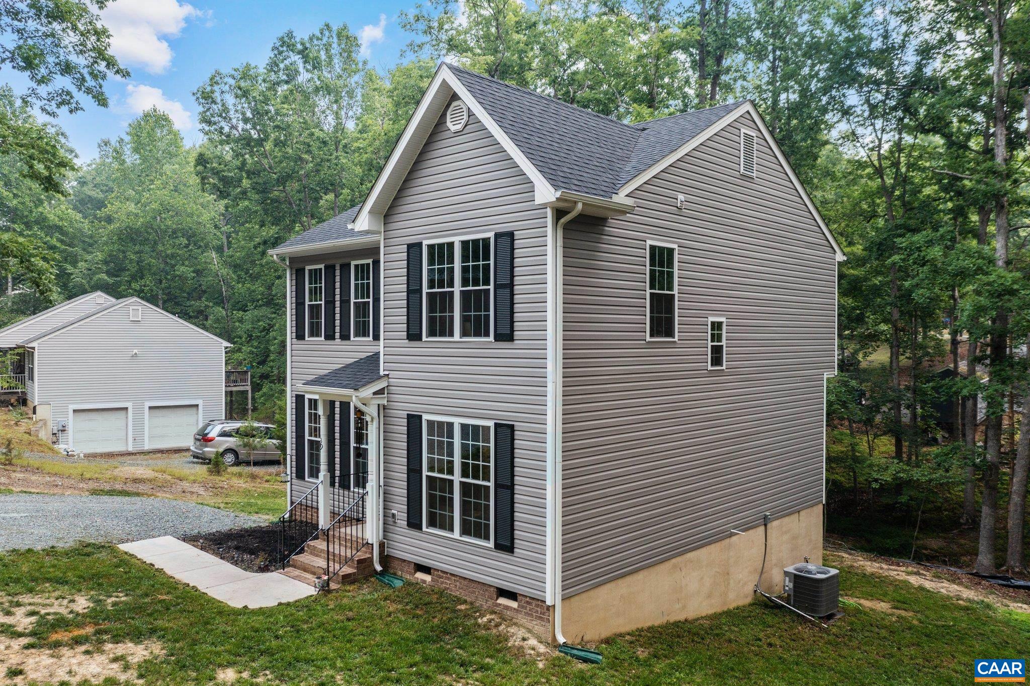 39 Amethyst Road Palmyra, VA 22963 - Photo 34 of 42 a view of a house with a yard
