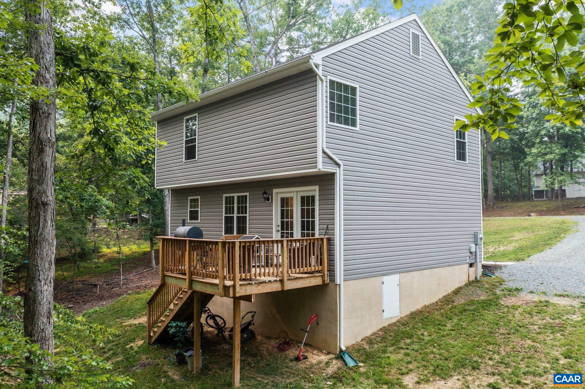 39 Amethyst Road Palmyra, VA 22963 - Photo 35 of 42 a view of a house with backyard and sitting area